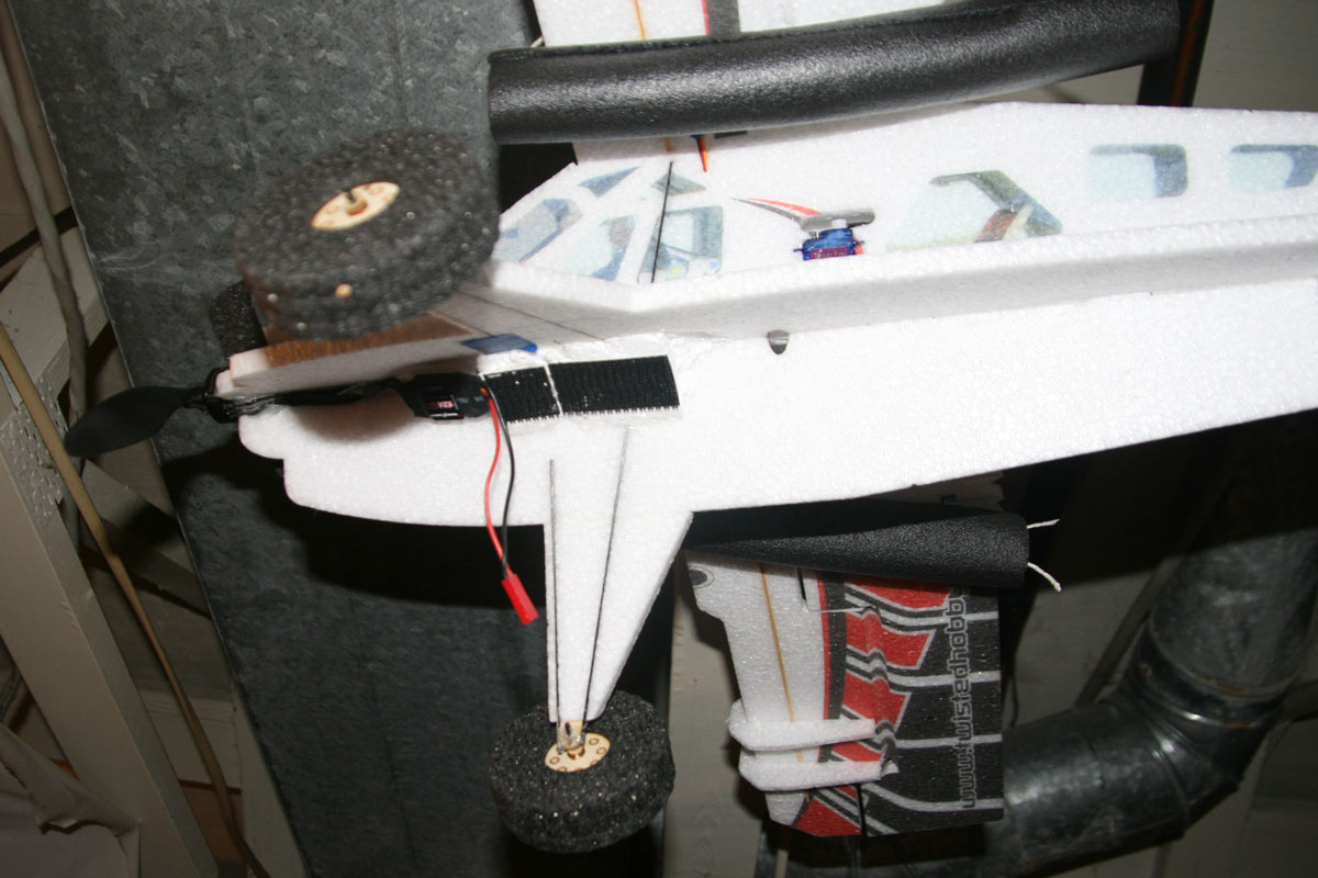 The battery mounting strip is made of regular Styrofoam with Scotch Heavy Duty Fastener attached.