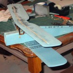 Testing fit and position of top wing prior to gluing it to the cabanes