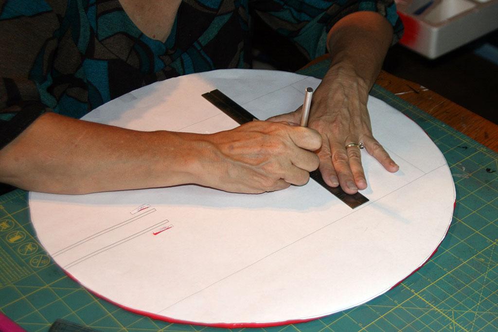 Cutting slots in the wing