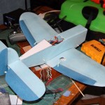 Control surfaces painted and mounted